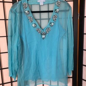 Blue top with pearl embroidery.